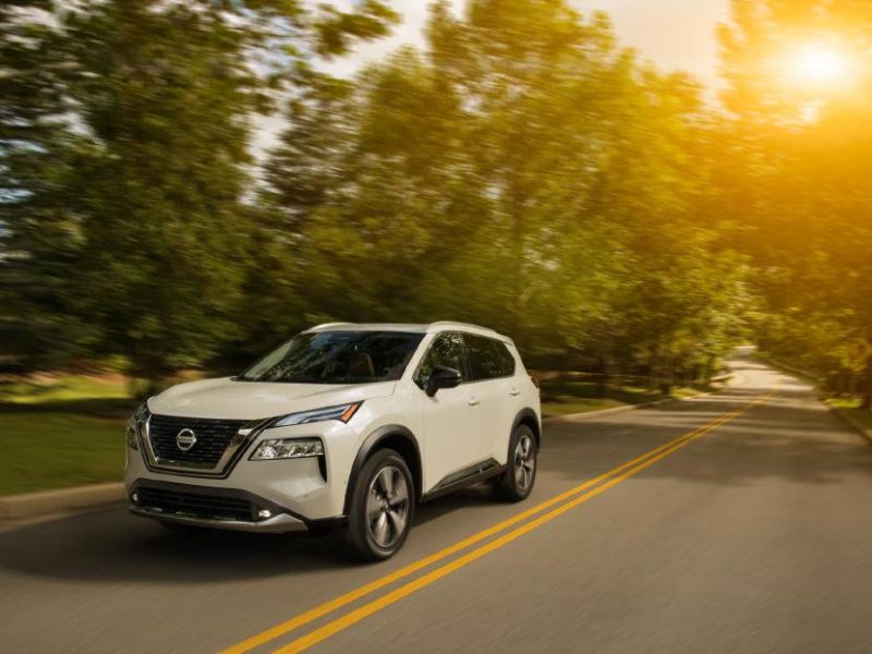 2021 nissan rogue driving on a b road