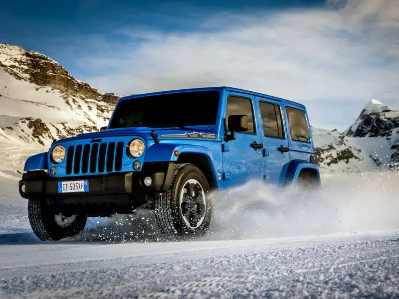 2014 blue polar edition jeep wrangler 5 door driving in the alps