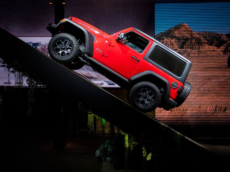 2018 red jeep rubicon with the optional hardtop on a demo incline