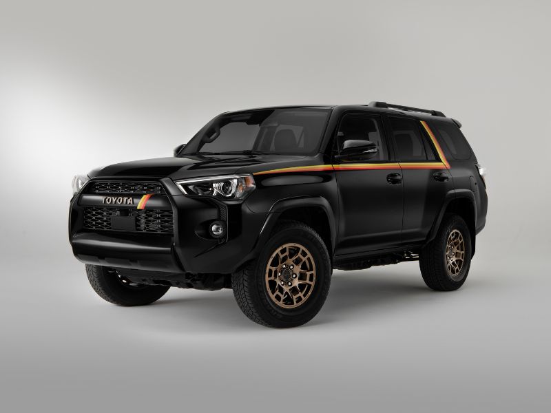 2022 black with pin striping 40th special edition toyota 4runner in a photo studio